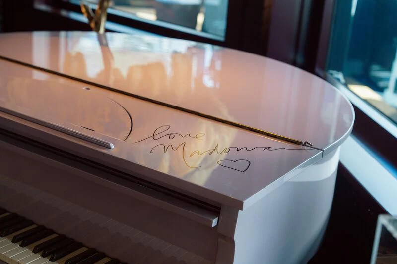 a white cup with a design on it aboard PINK SHADOW Yacht for Sale