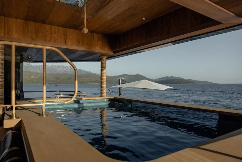 a large pool of water aboard PINK SHADOW Yacht for Sale