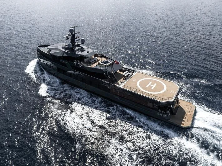 a military tank driving on water aboard PINK SHADOW Yacht for Sale