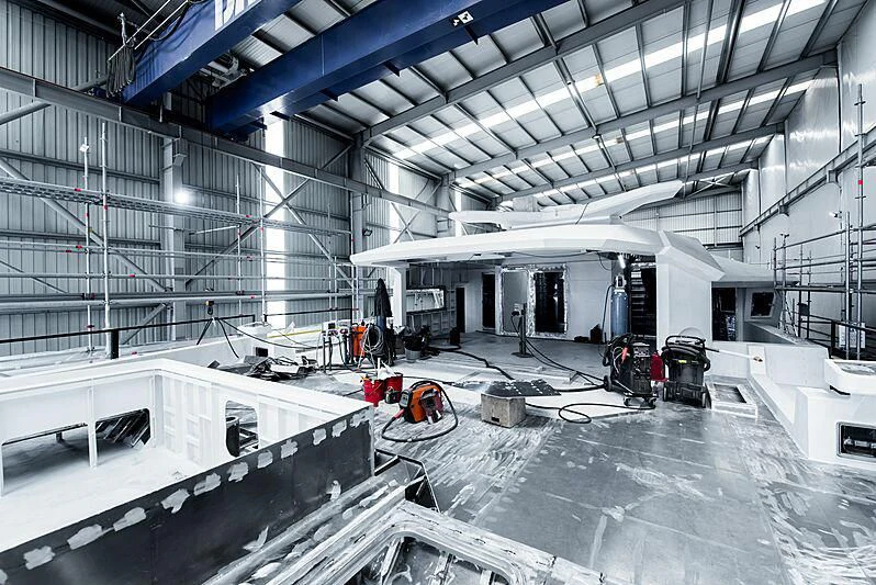 a large warehouse with several machines aboard PINK SHADOW Yacht for Sale