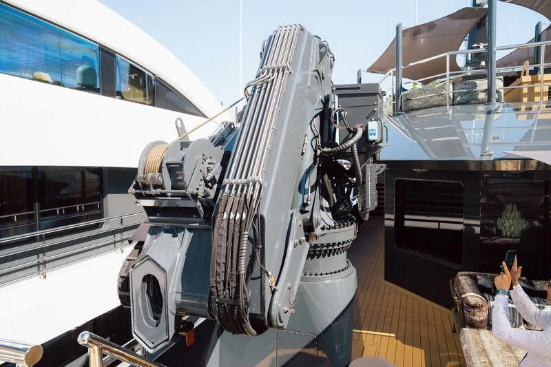 a large white vehicle with a large metal object on the front aboard PINK SHADOW Yacht for Sale