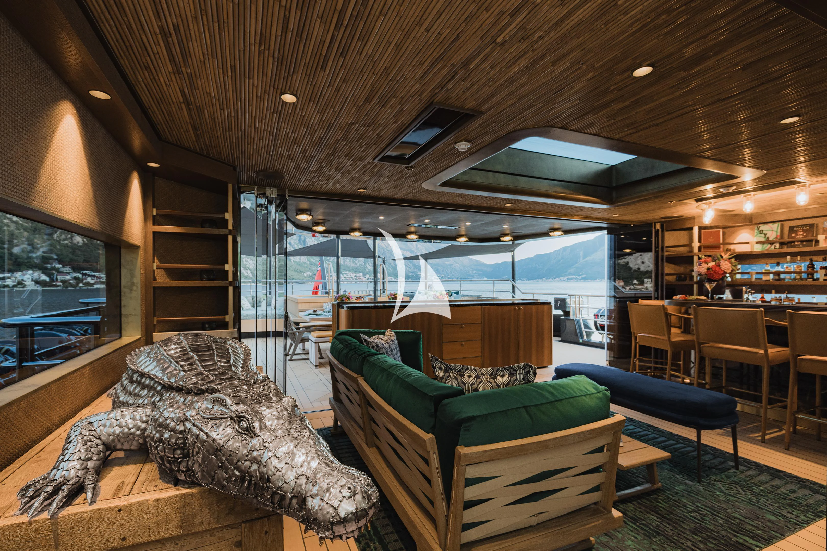 a room with a couch and a tv aboard PINK SHADOW Yacht for Sale