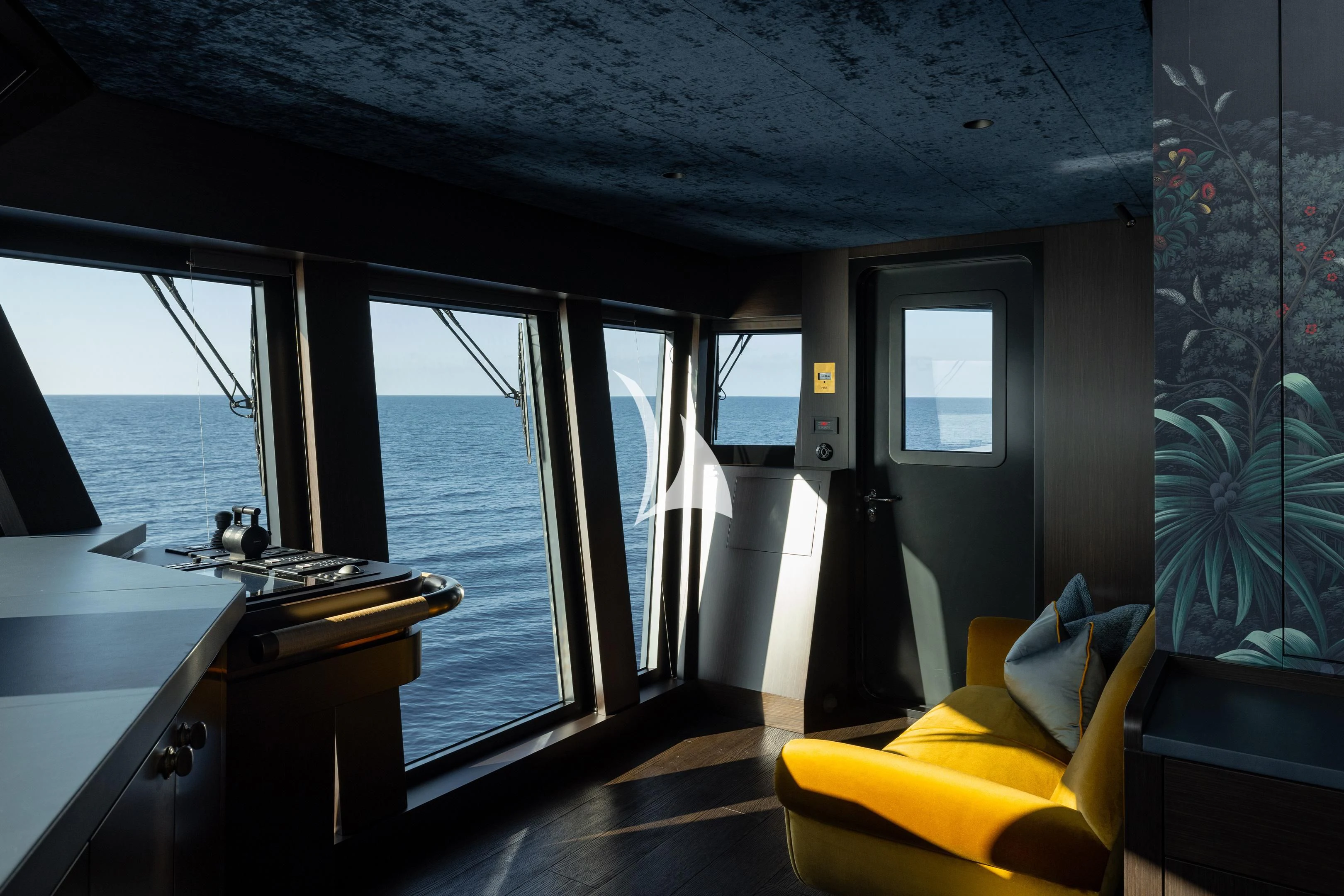 a room with a desk and a window aboard PINK SHADOW Yacht for Sale
