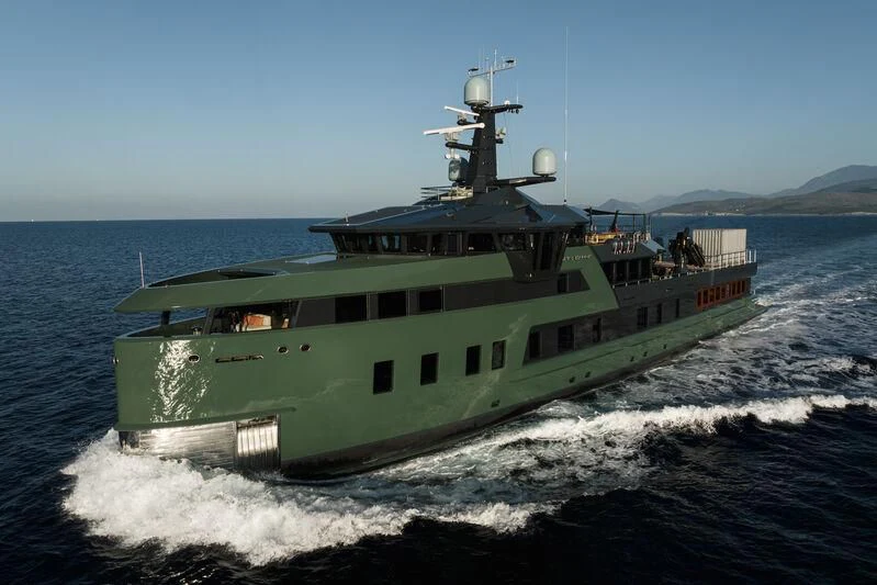 a large green ship on the water aboard PINK SHADOW Yacht for Sale