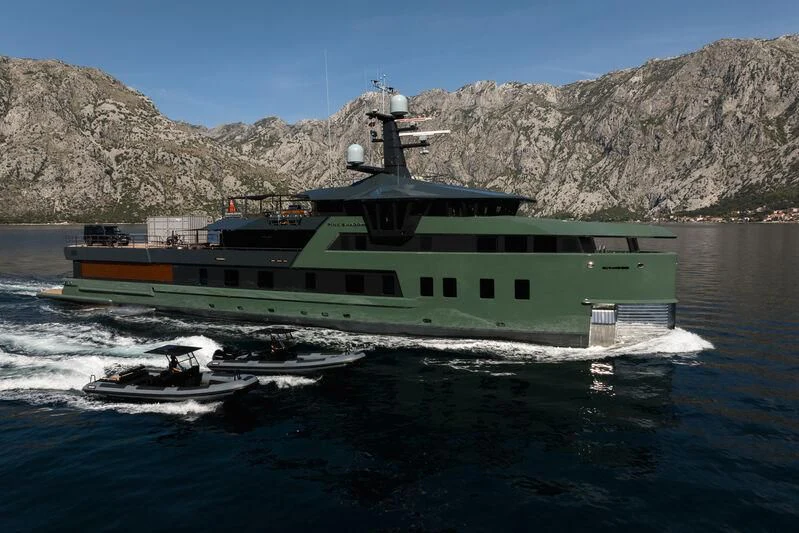 a green and black boat on water aboard PINK SHADOW Yacht for Sale
