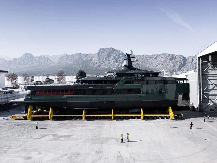 a large green train on a track aboard PINK SHADOW Yacht for Sale