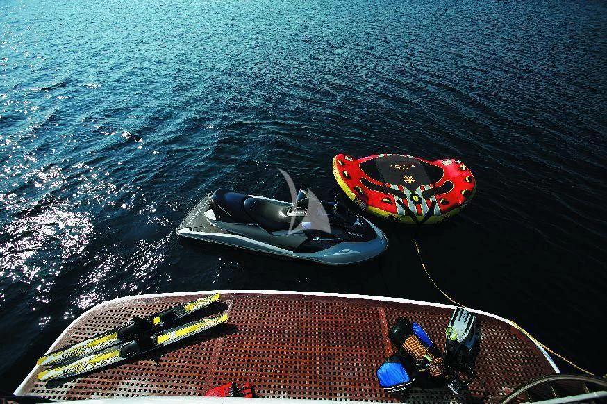 a boat with a kayak on it aboard OBSESION Yacht for Sale