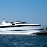 a white yacht on the water aboard OBSESION Yacht for Sale