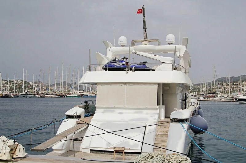 a white boat in the water aboard ETERNITY Yacht for Sale