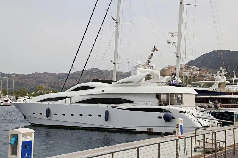 a white yacht docked aboard ETERNITY Yacht for Sale