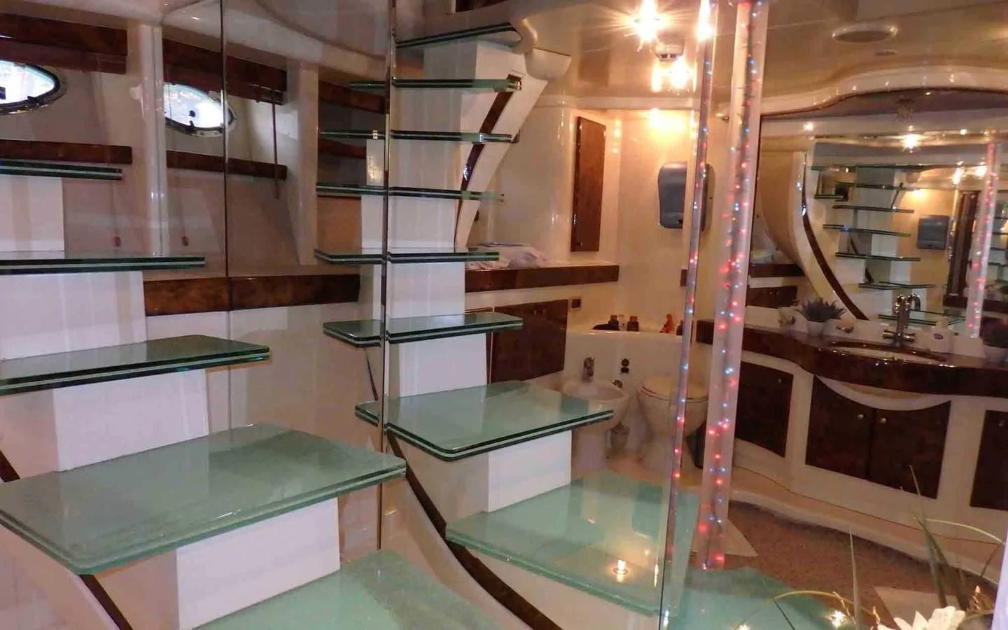 a bathroom with glass walls aboard ETERNITY Yacht for Sale