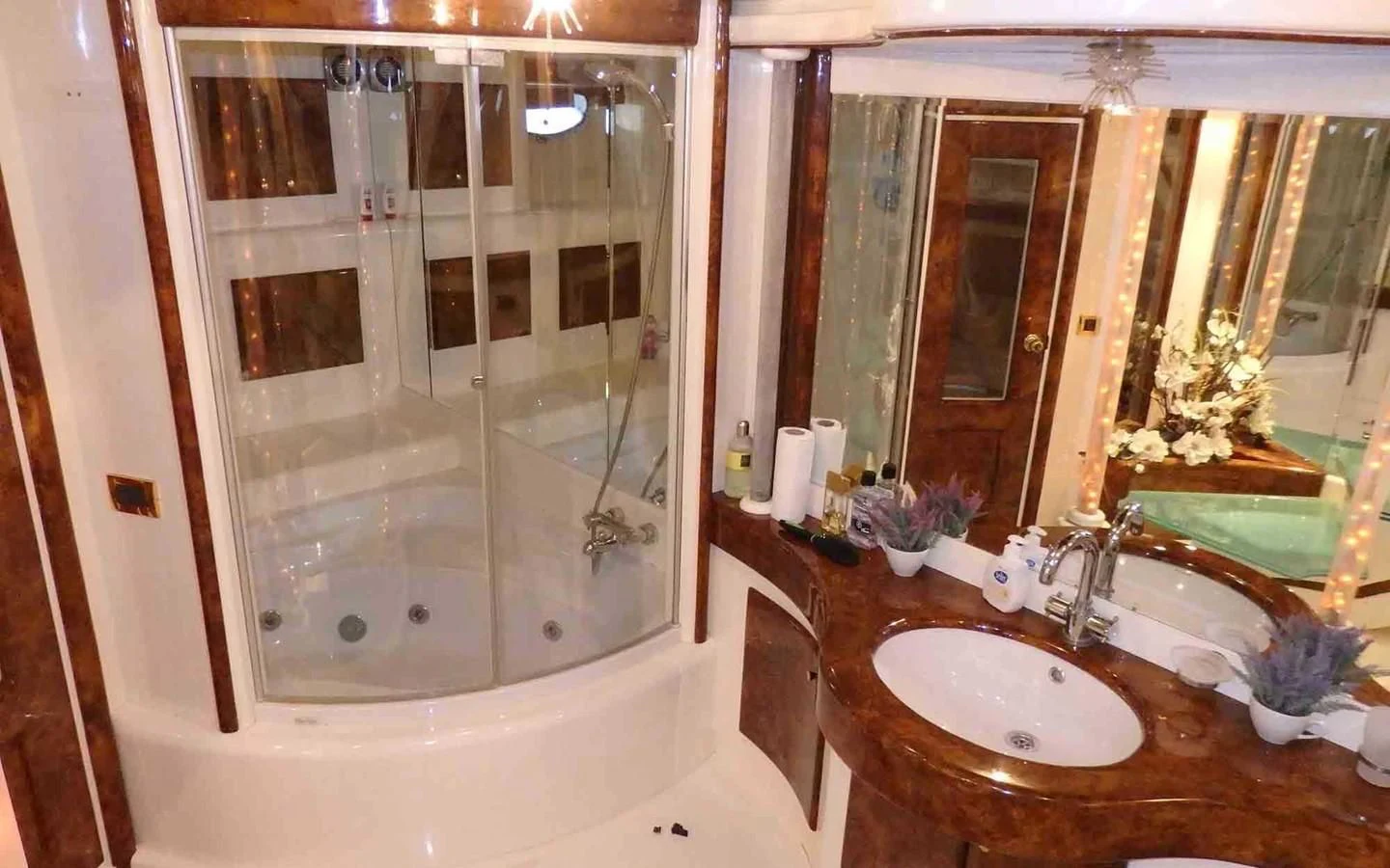 a bathroom with a large shower aboard ETERNITY Yacht for Sale