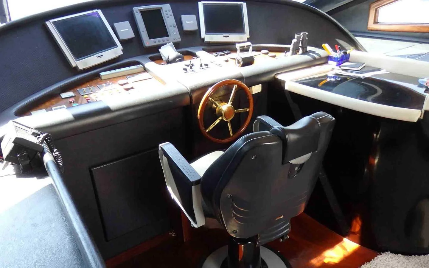 a car with a steering wheel aboard ETERNITY Yacht for Sale
