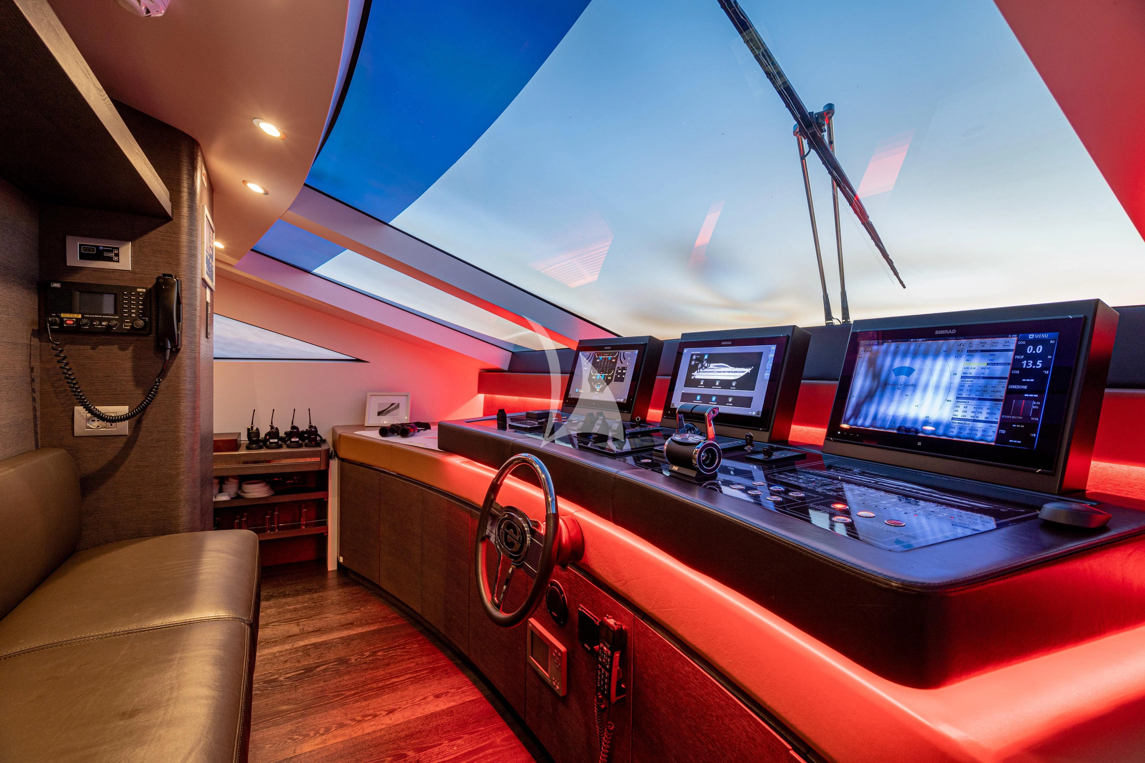 a room with a computer and a couch aboard 55 FIFTYFIVE Yacht for Charter