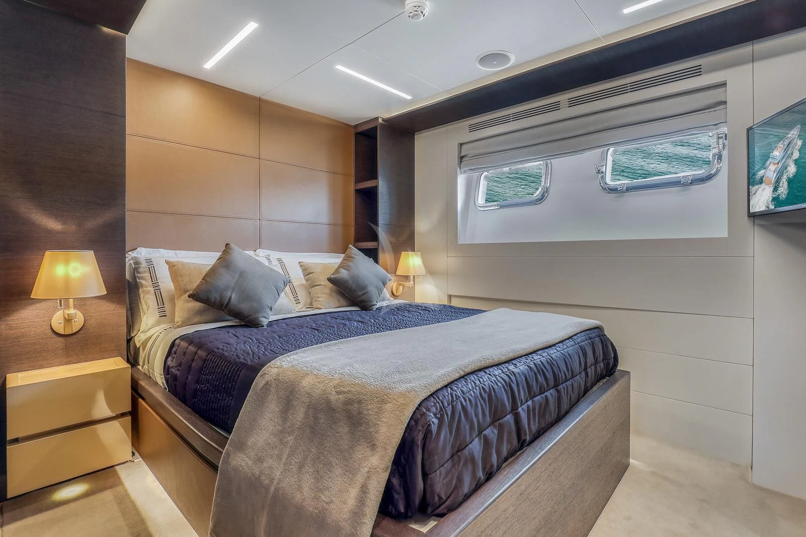 a bed in a room aboard 55 FIFTYFIVE Yacht for Charter