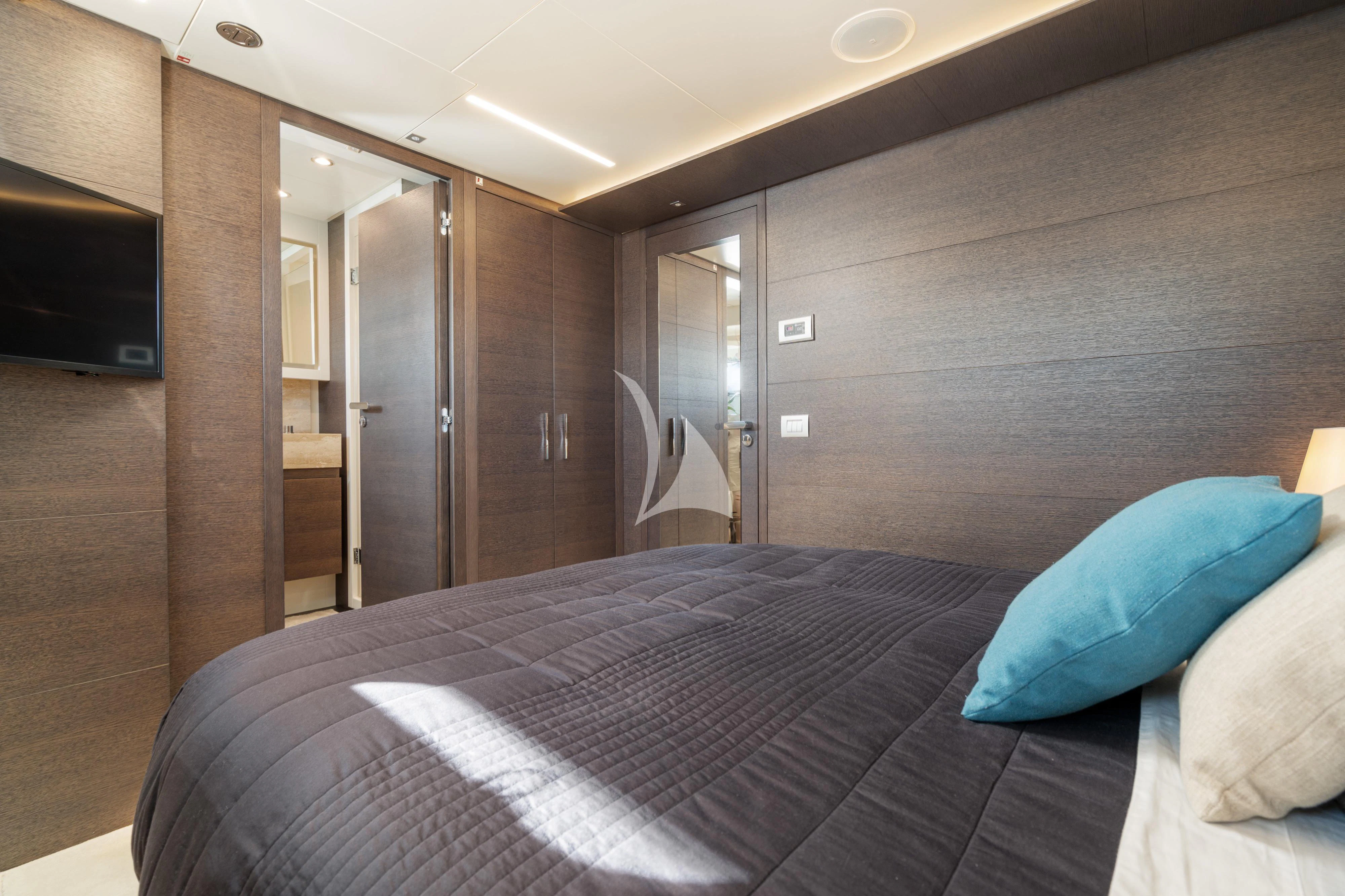a bed in a room aboard 55 FIFTYFIVE Yacht for Charter