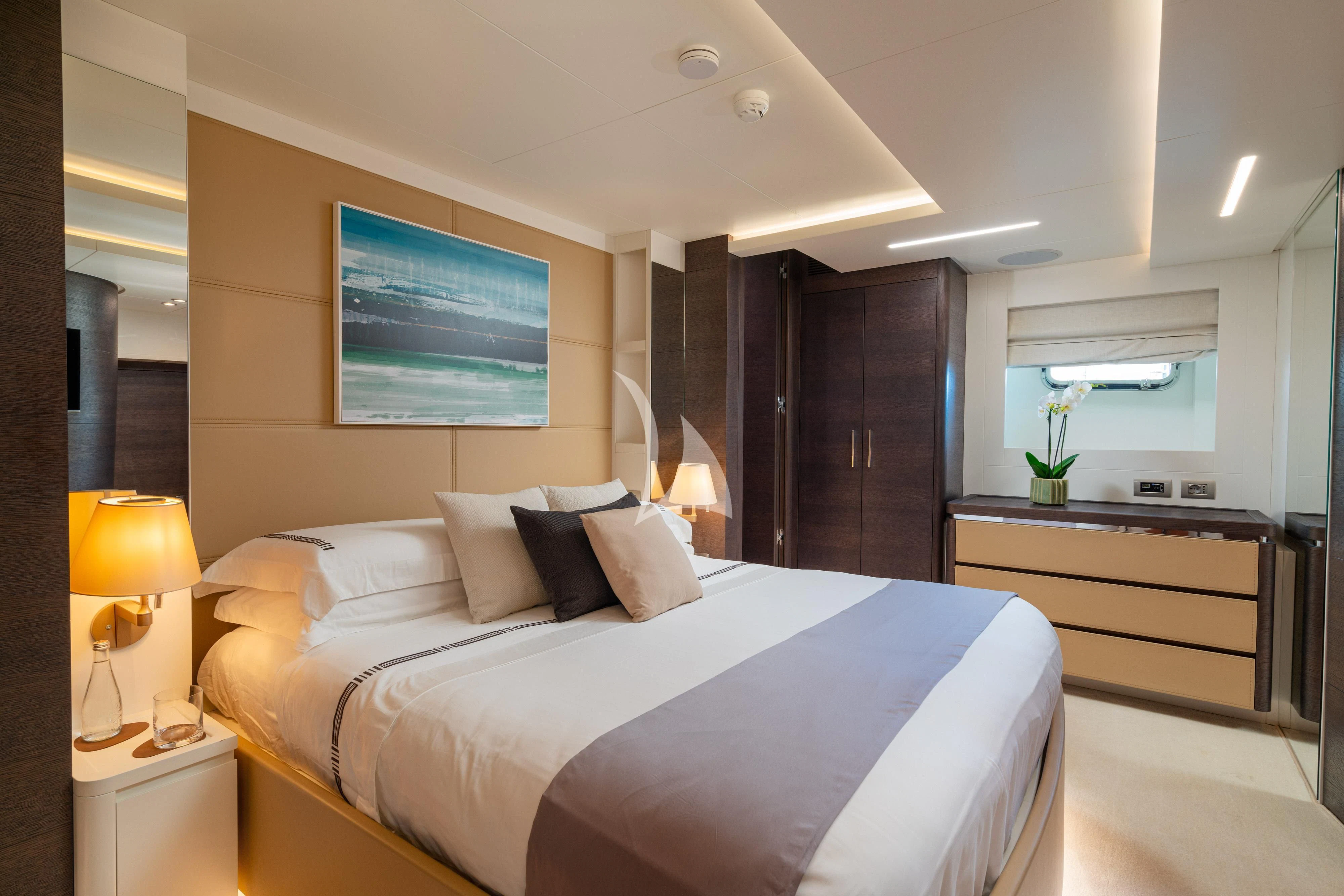 a bed in a hotel room aboard 55 FIFTYFIVE Yacht for Charter