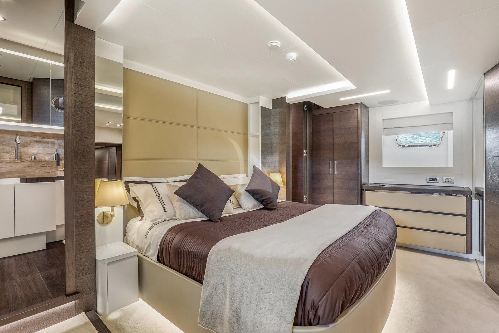 a large bedroom with a large bed aboard 55 FIFTYFIVE Yacht for Charter