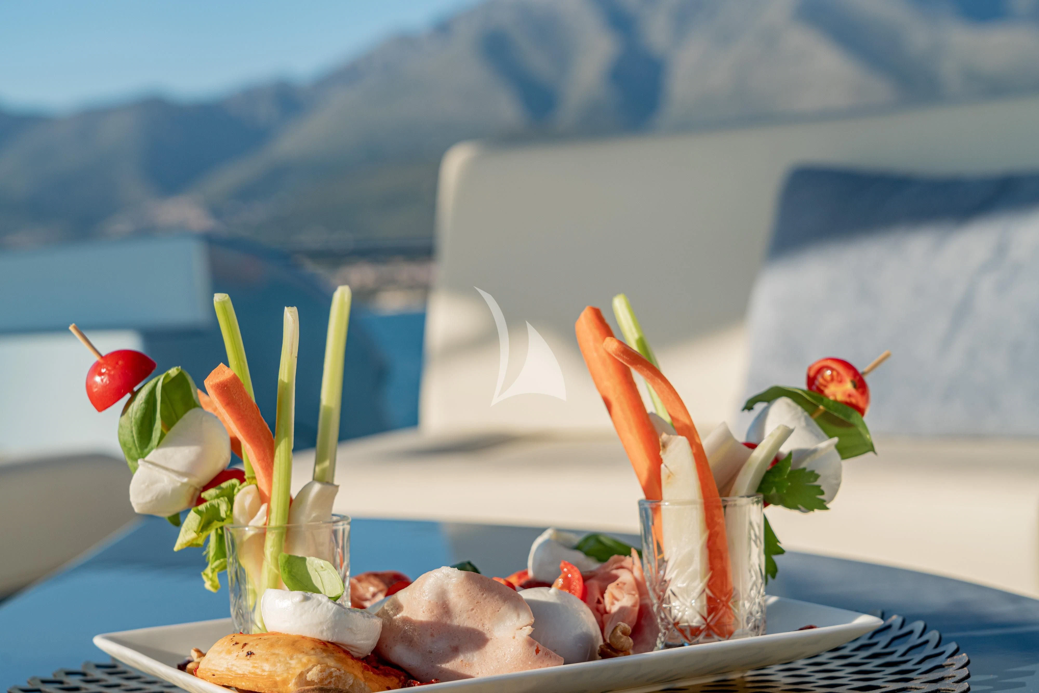 a tray with food on it aboard 55 FIFTYFIVE Yacht for Charter