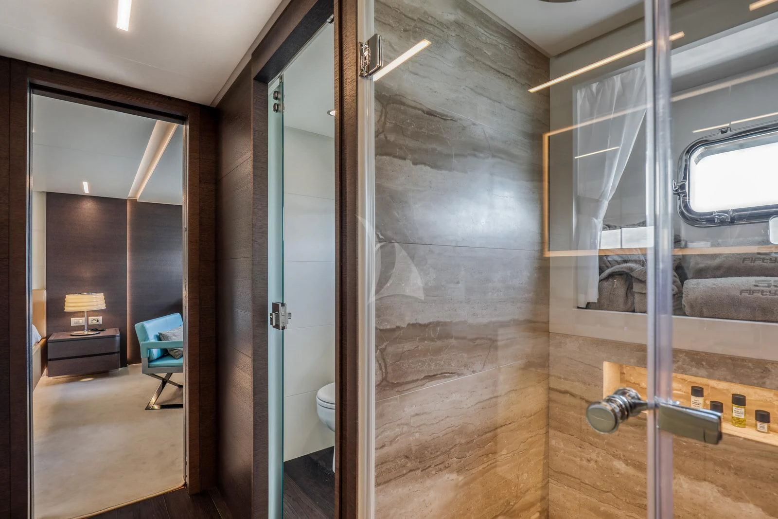 a bathroom with glass doors aboard 55 FIFTYFIVE Yacht for Charter