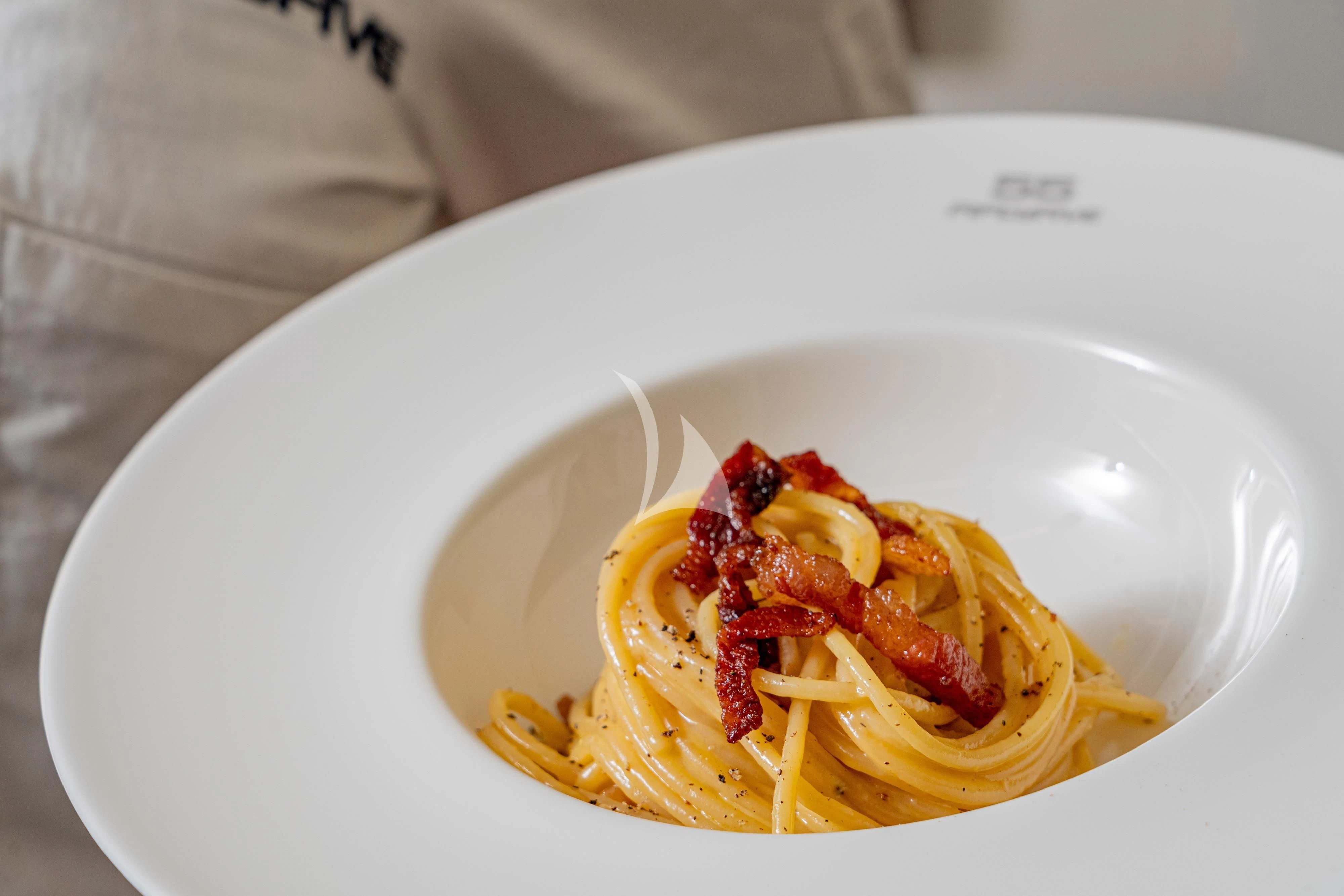 a plate of spaghetti aboard 55 FIFTYFIVE Yacht for Charter