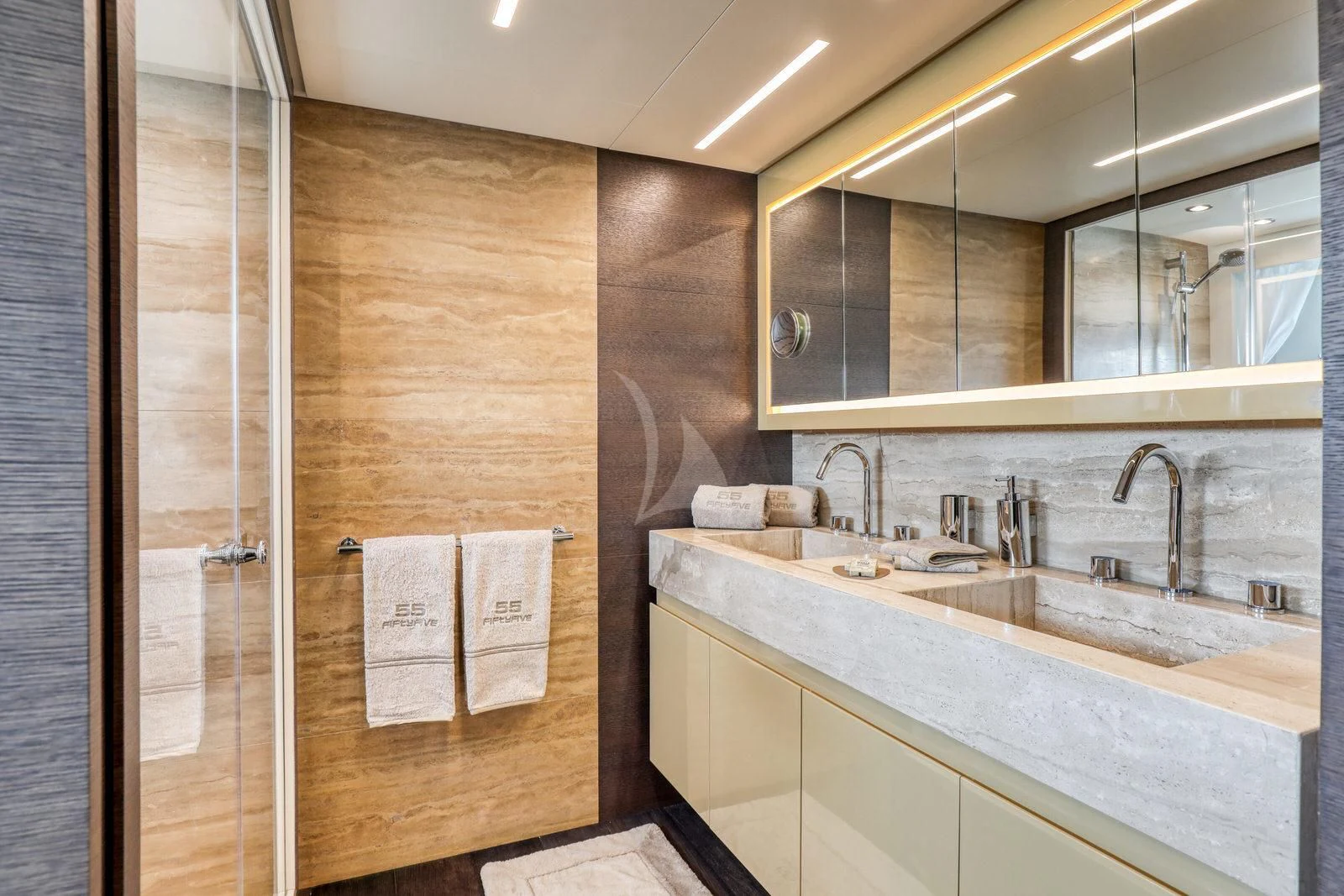 a bathroom with a sink and a mirror aboard 55 FIFTYFIVE Yacht for Charter