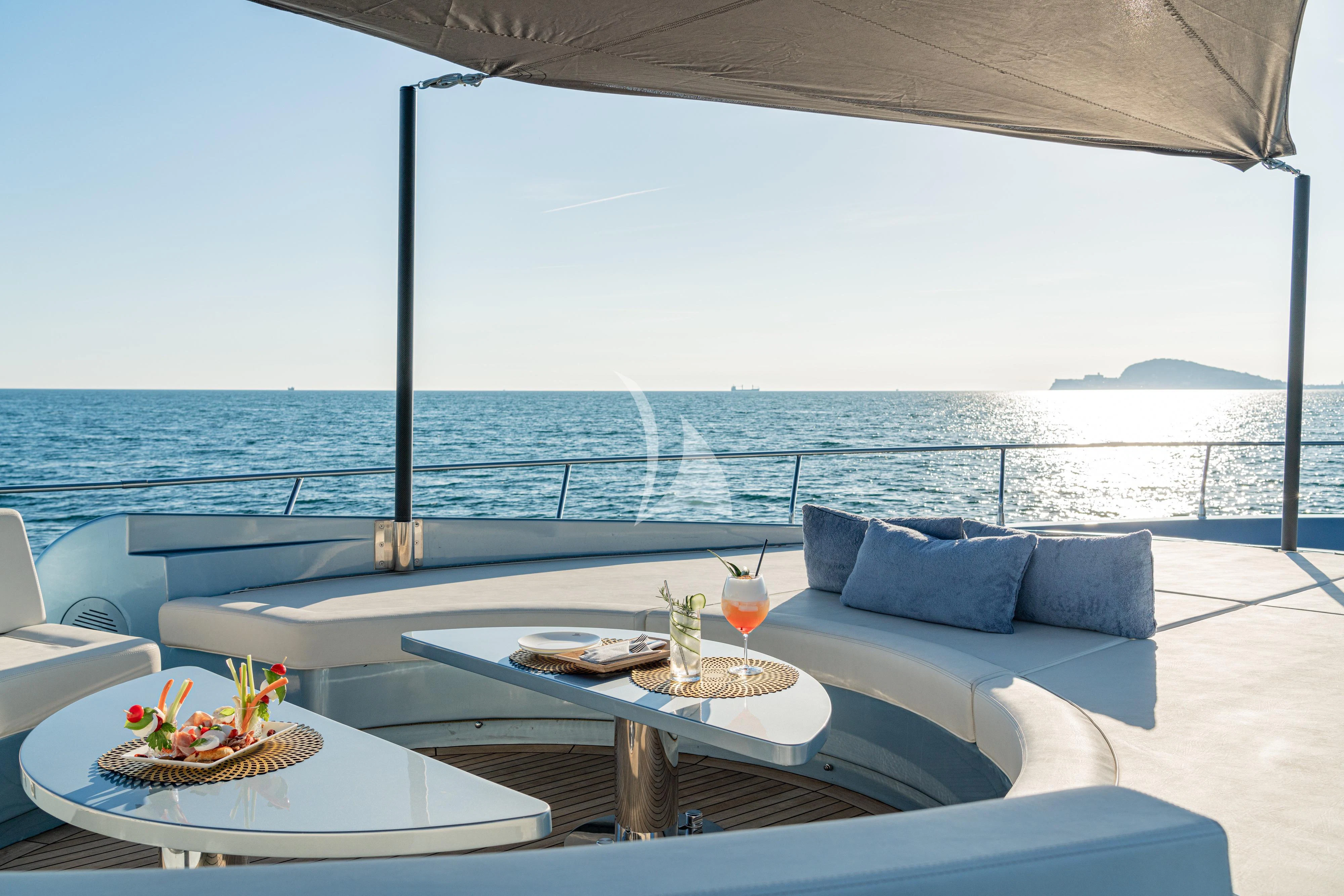 a table with food on it aboard 55 FIFTYFIVE Yacht for Charter