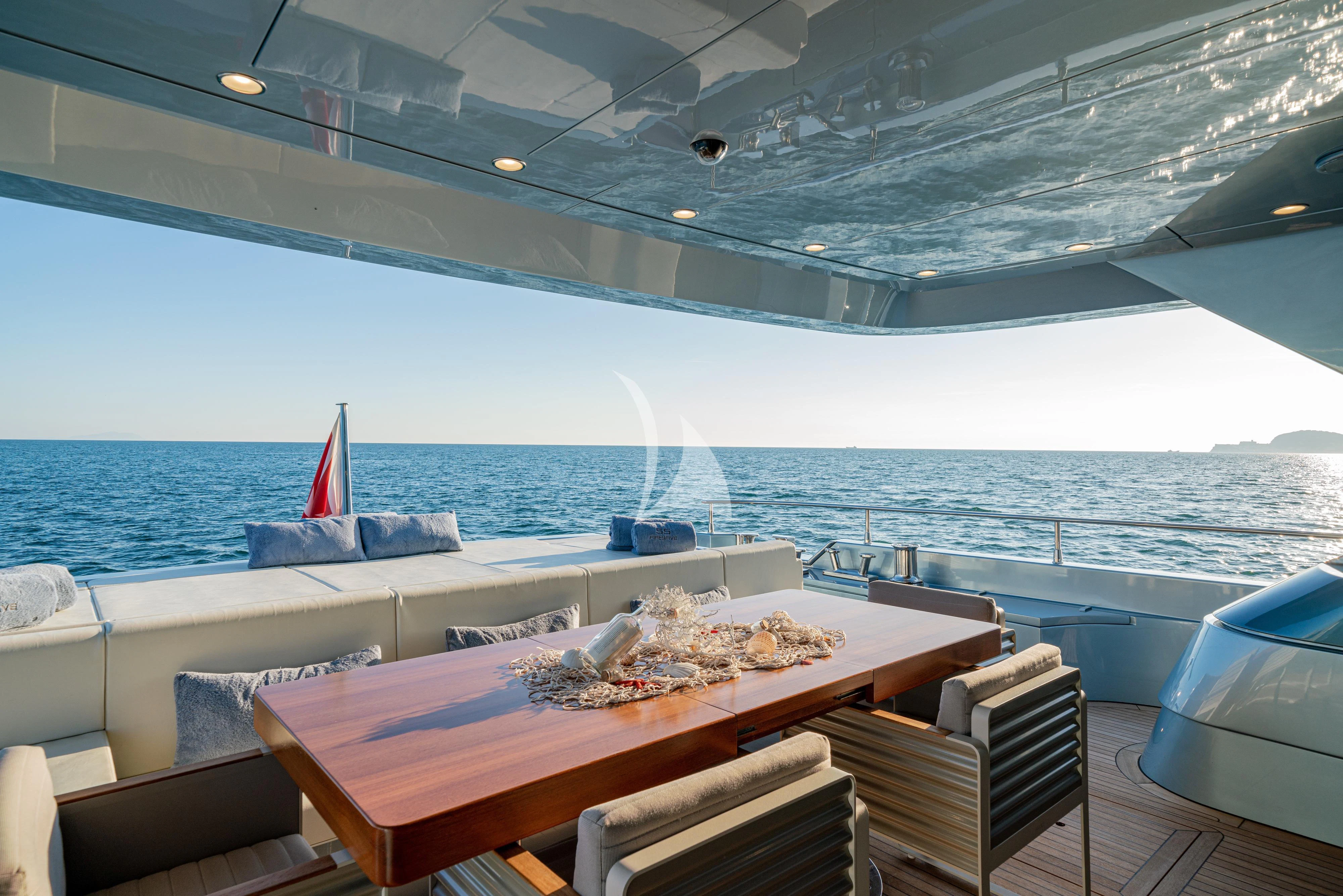 a table on a boat aboard 55 FIFTYFIVE Yacht for Charter