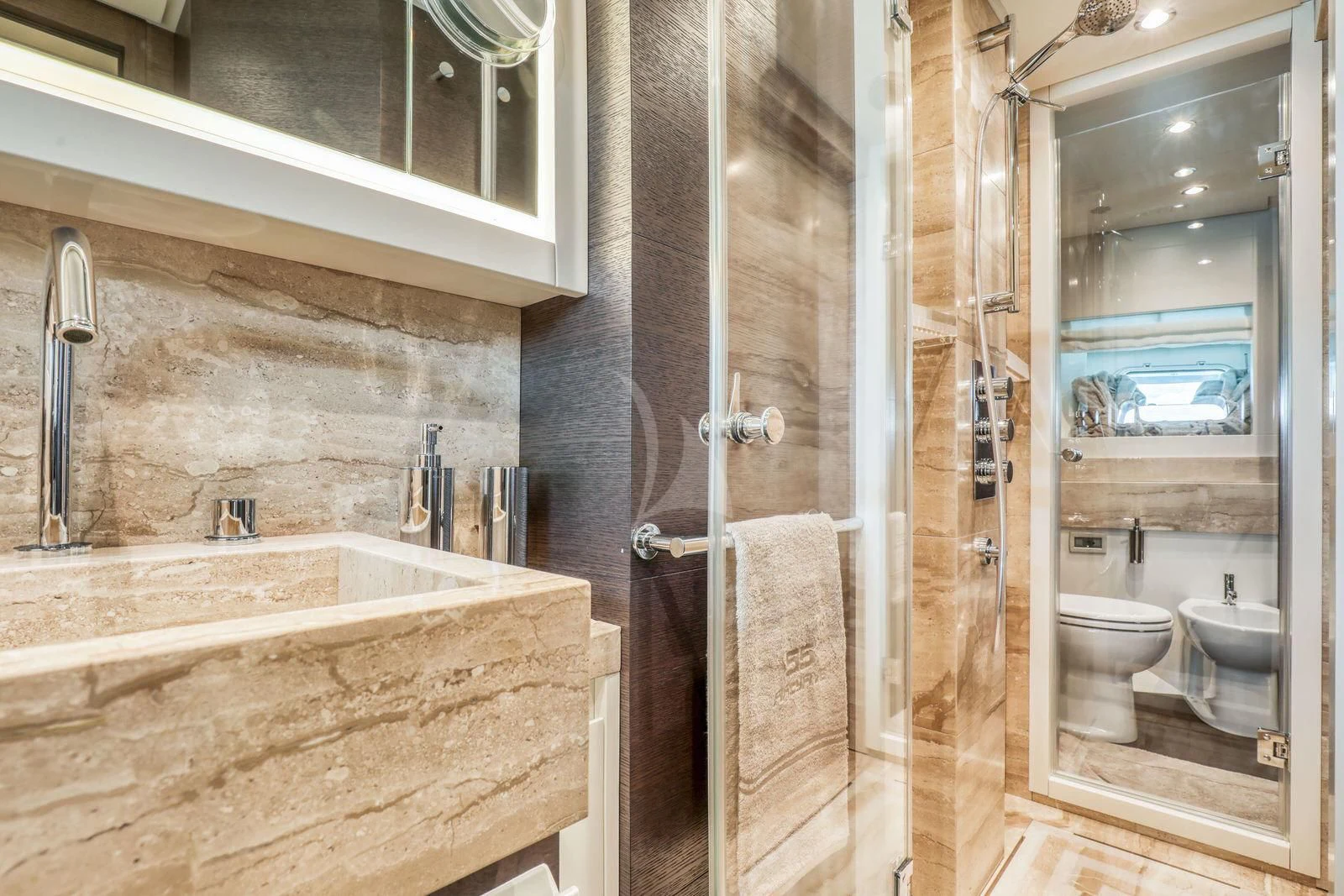 a bathroom with a tub sink and toilet aboard 55 FIFTYFIVE Yacht for Charter