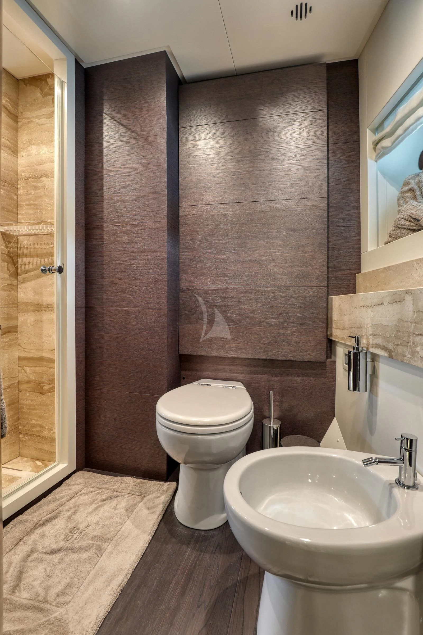 a bathroom with a sink and a toilet aboard 55 FIFTYFIVE Yacht for Charter
