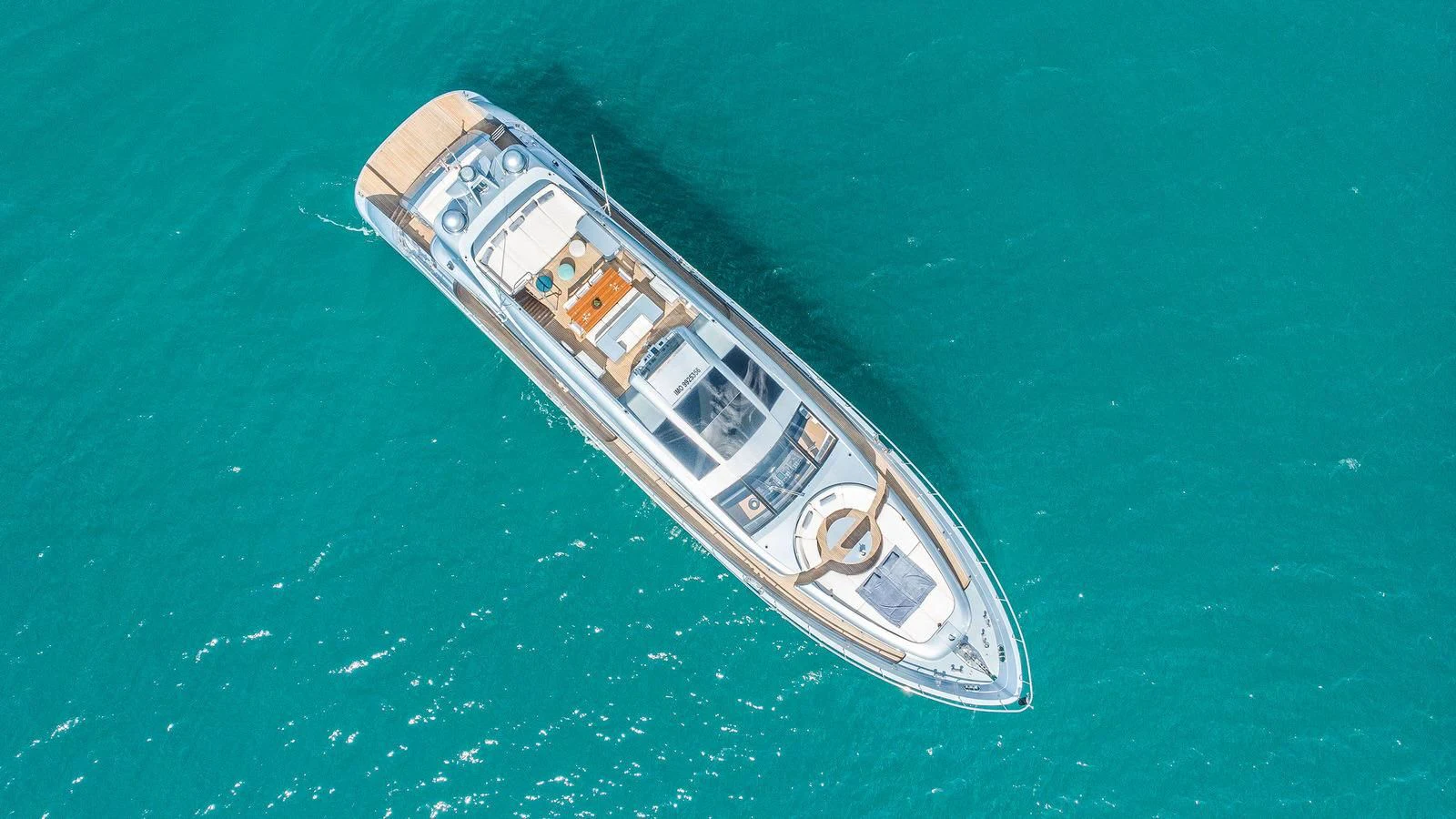 a small boat in the water aboard 55 FIFTYFIVE Yacht for Charter