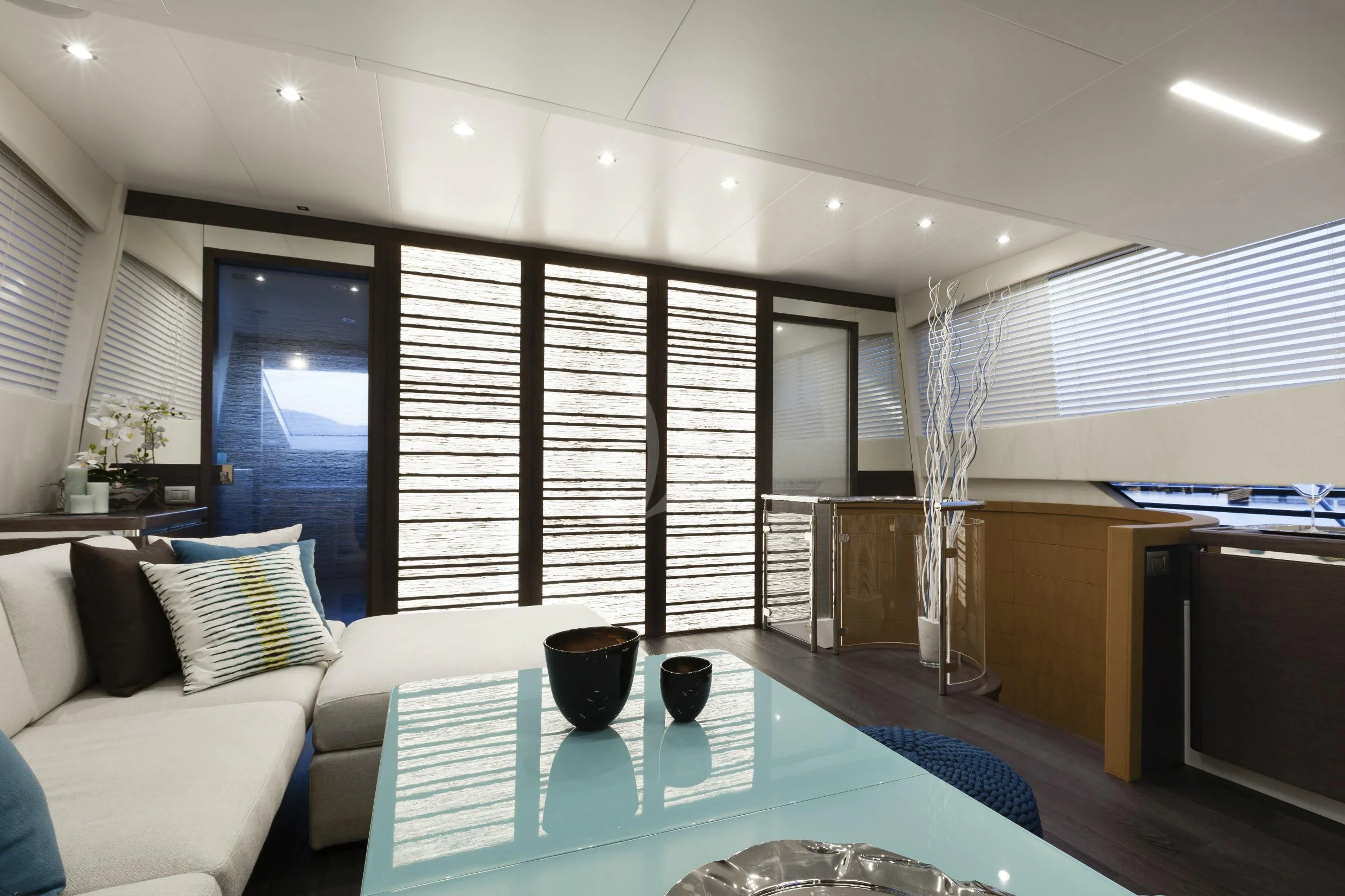 a room with a table and chairs aboard 55 FIFTYFIVE Yacht for Charter