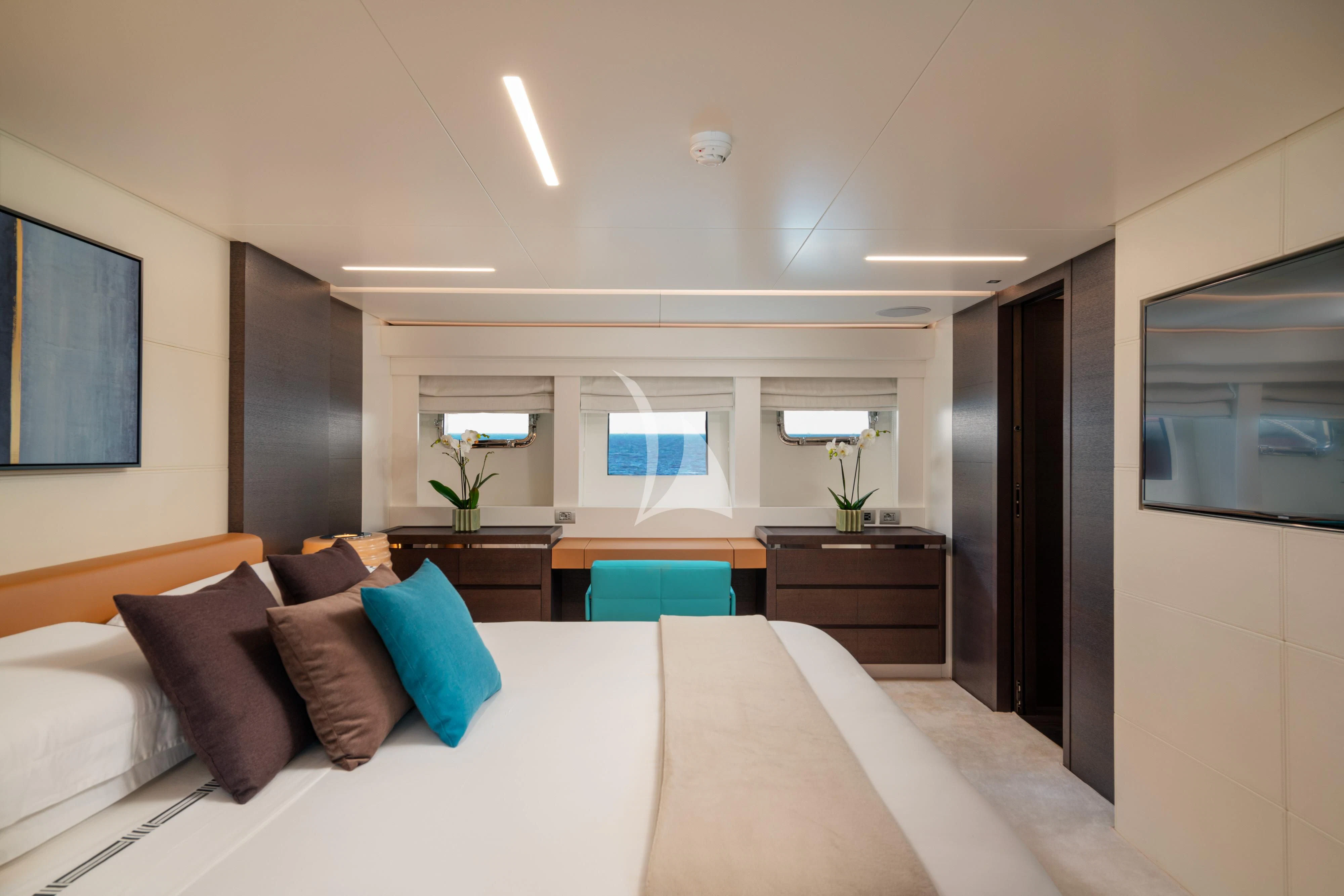 a bed with pillows and pillows aboard 55 FIFTYFIVE Yacht for Charter