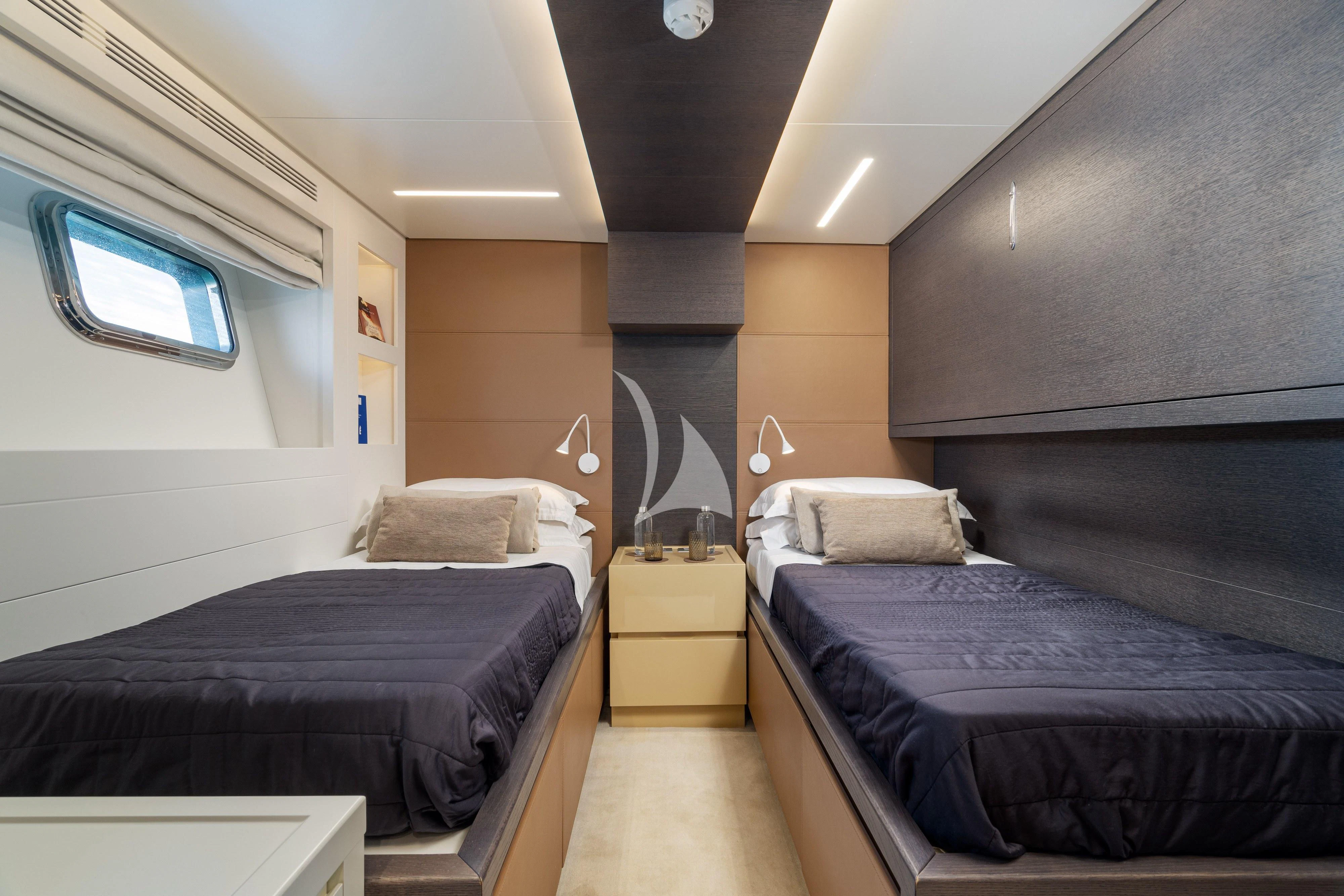 a room with two beds aboard 55 FIFTYFIVE Yacht for Charter