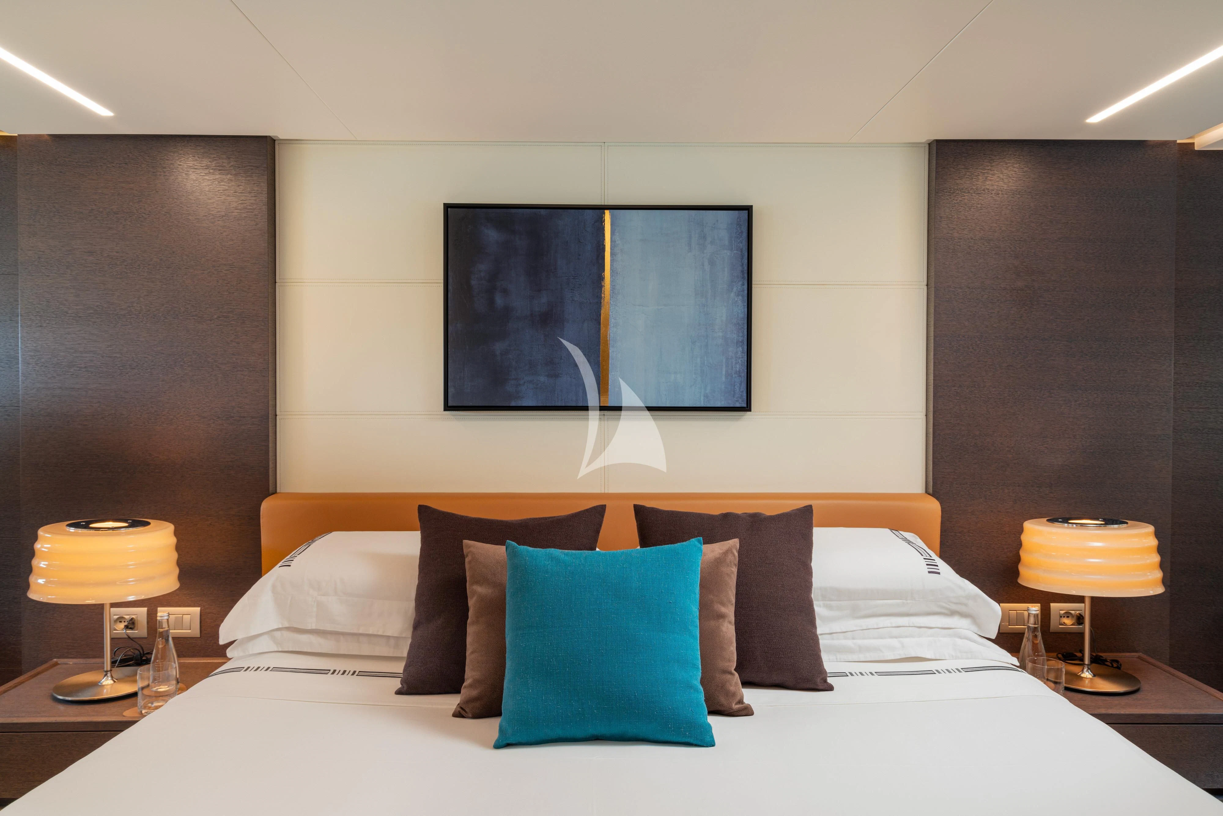 a bed with pillows and pillows aboard 55 FIFTYFIVE Yacht for Charter