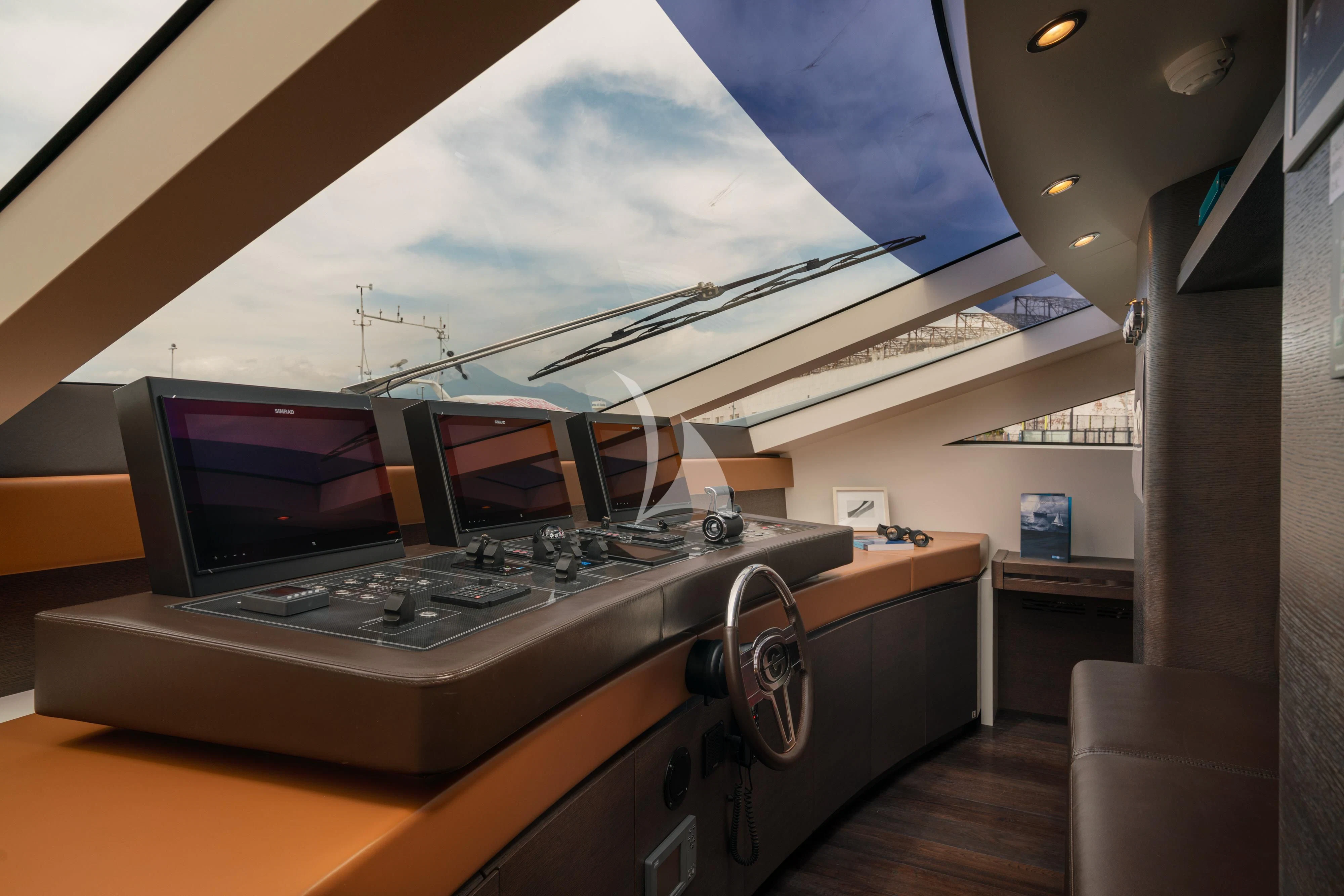 a laptop on a desk aboard 55 FIFTYFIVE Yacht for Charter