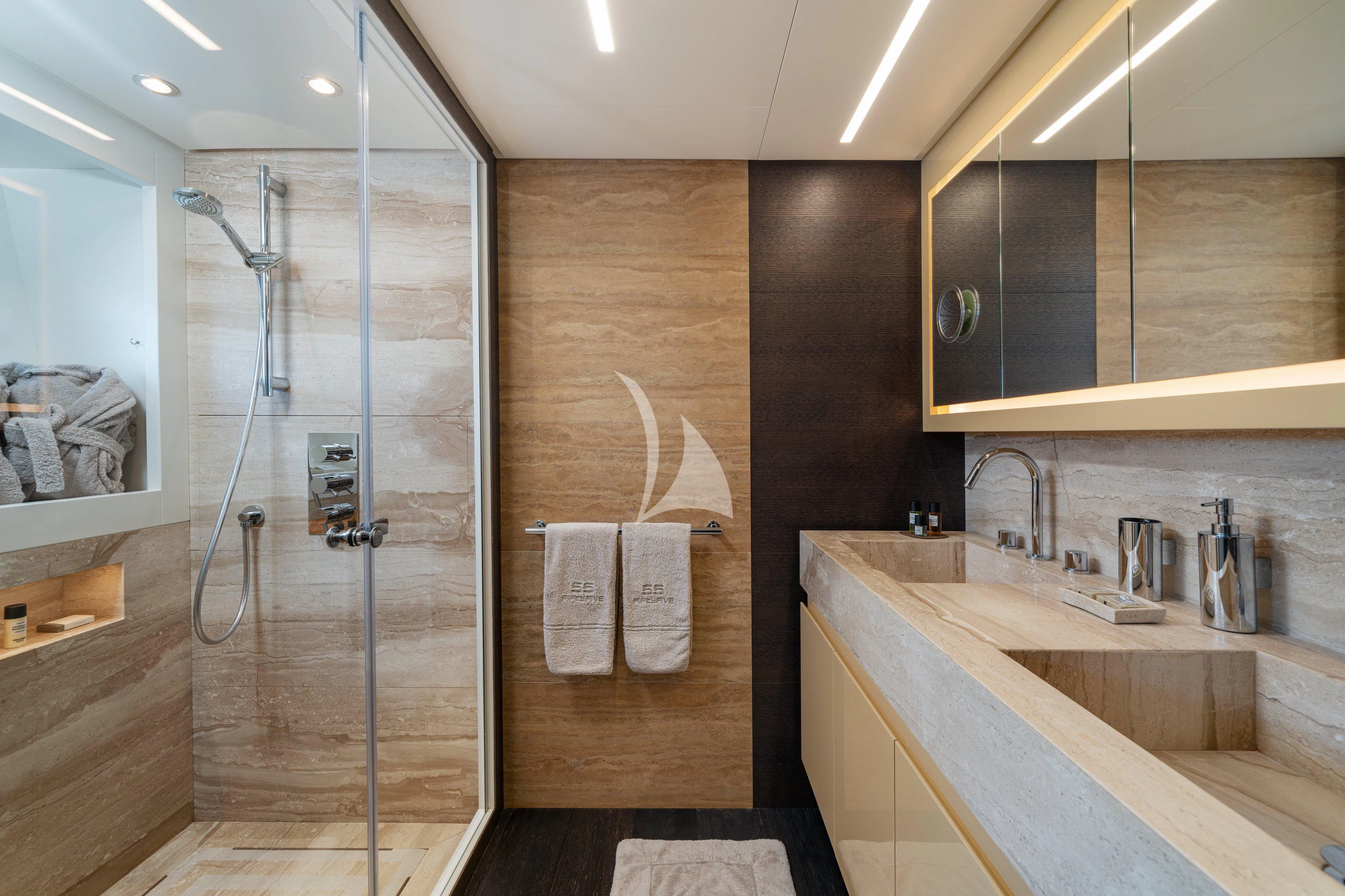 a bathroom with a shower and sink aboard 55 FIFTYFIVE Yacht for Charter