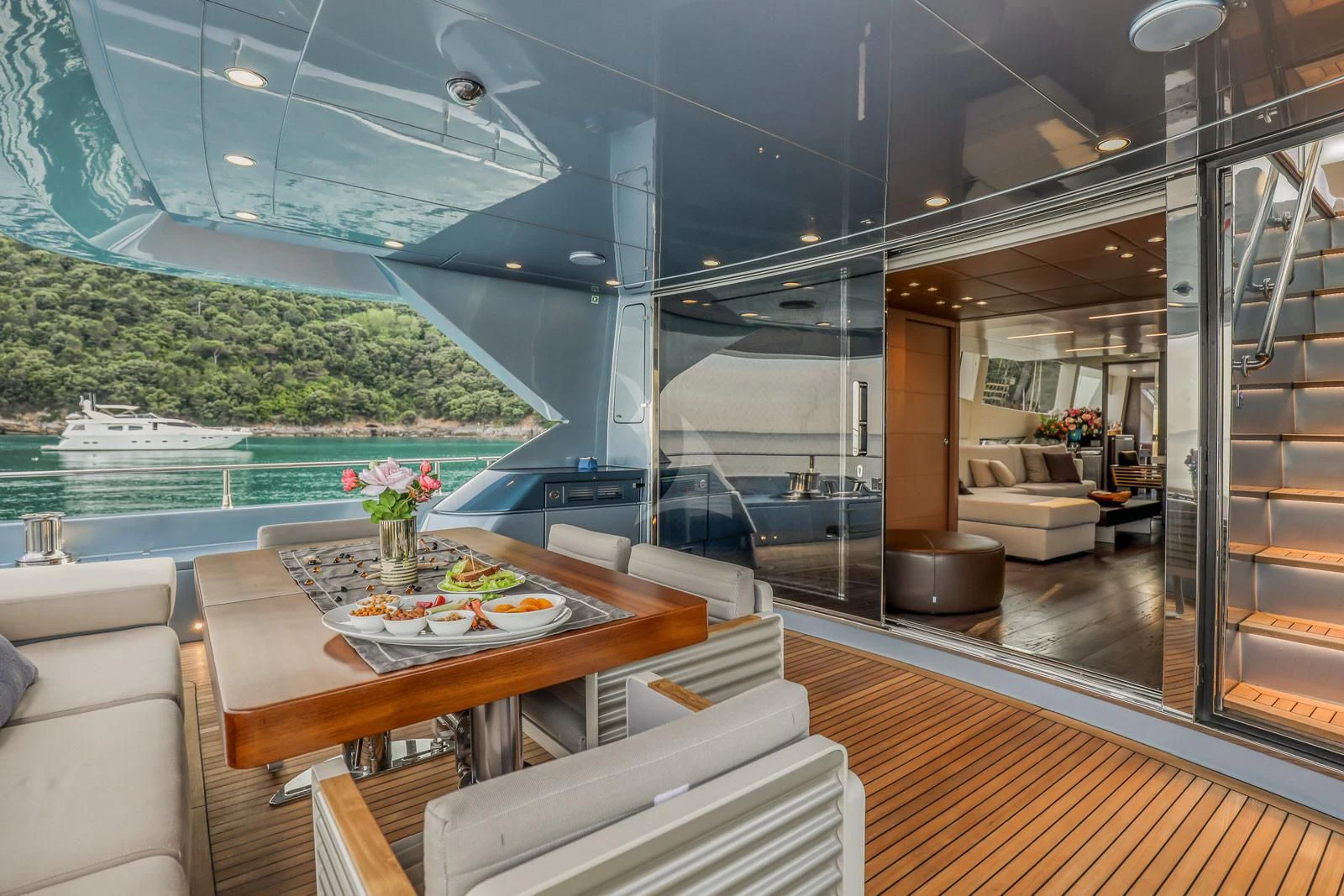 a room with a table and chairs aboard 55 FIFTYFIVE Yacht for Charter