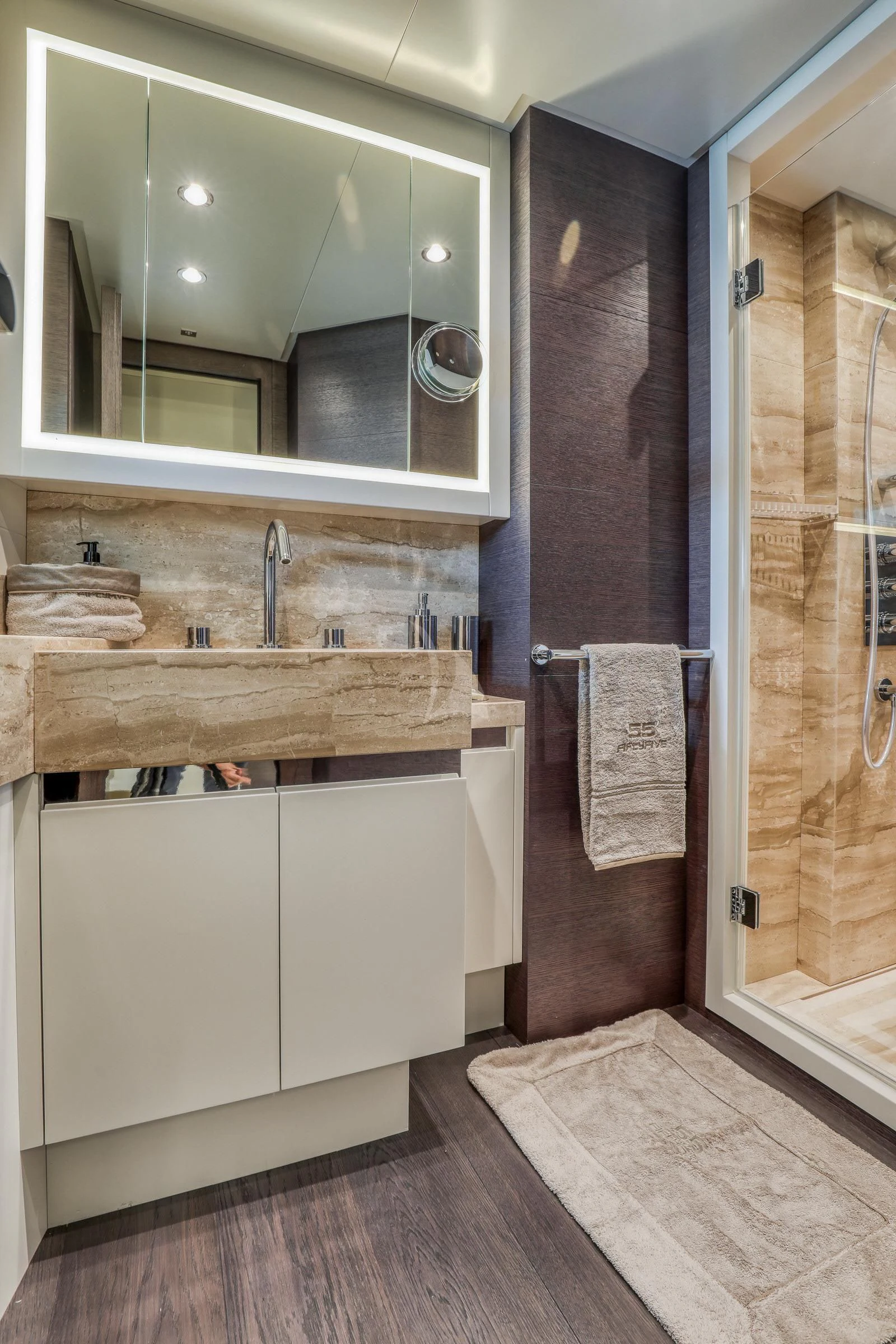 a bathroom with a sink and a mirror aboard 55 FIFTYFIVE Yacht for Charter