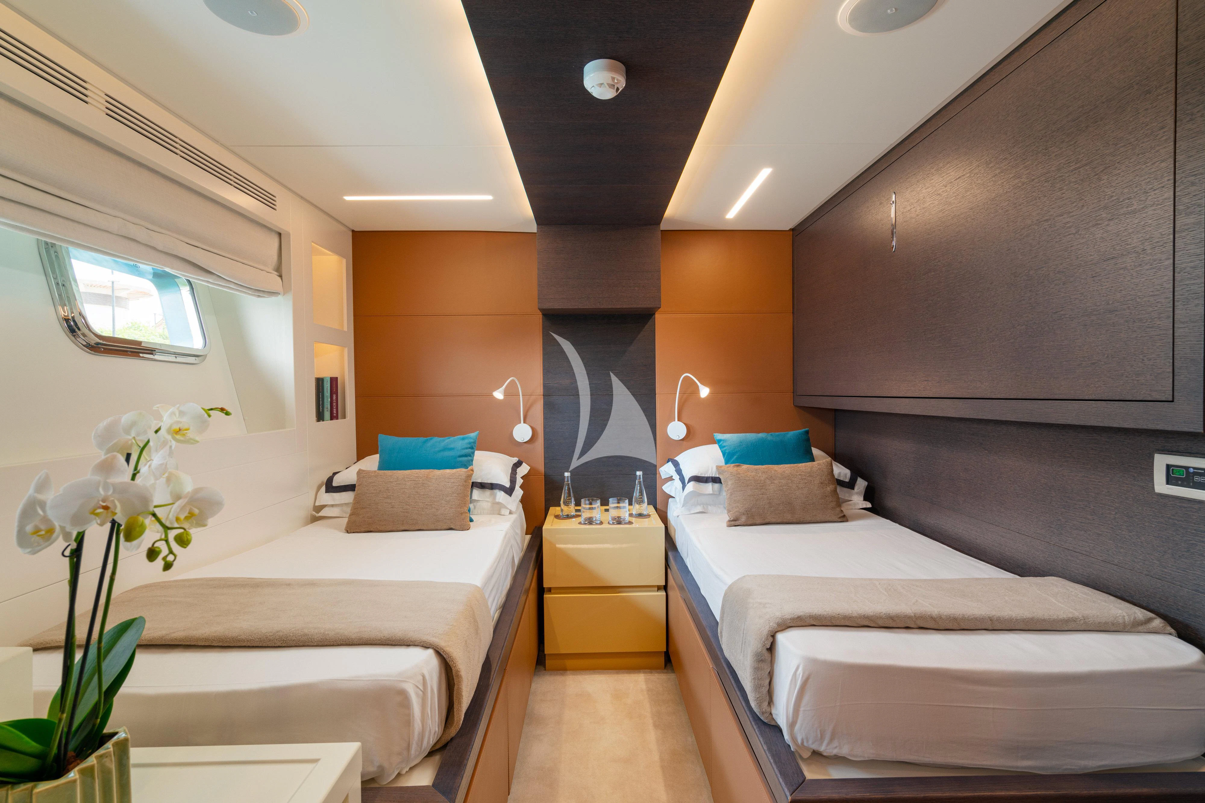a room with two beds aboard 55 FIFTYFIVE Yacht for Charter