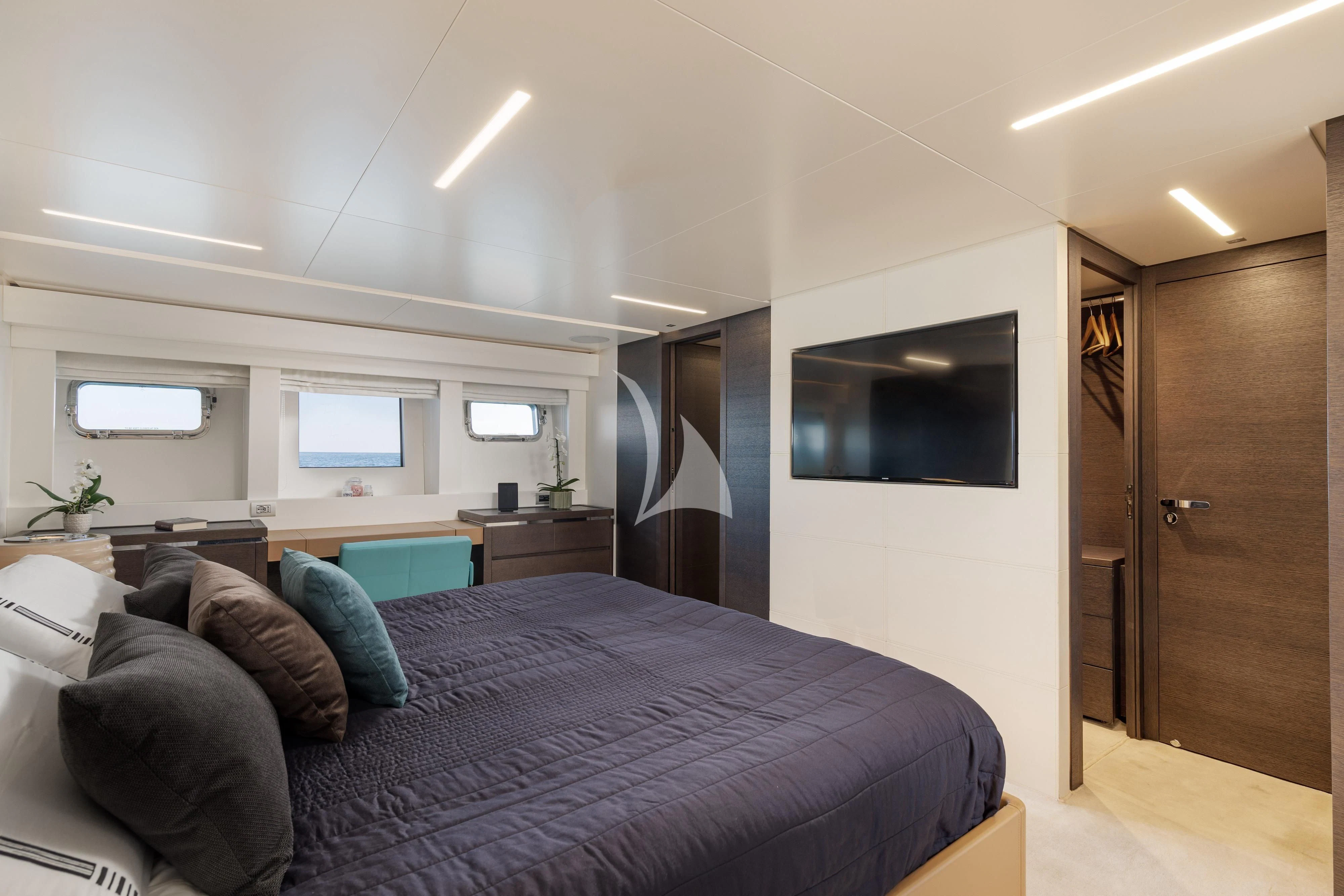 a bed in a room aboard 55 FIFTYFIVE Yacht for Charter