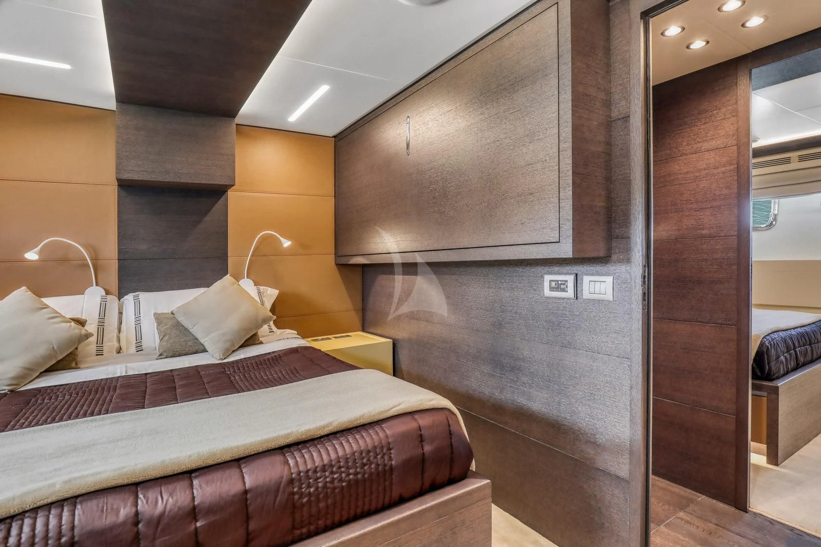 a bed in a hotel room aboard 55 FIFTYFIVE Yacht for Charter
