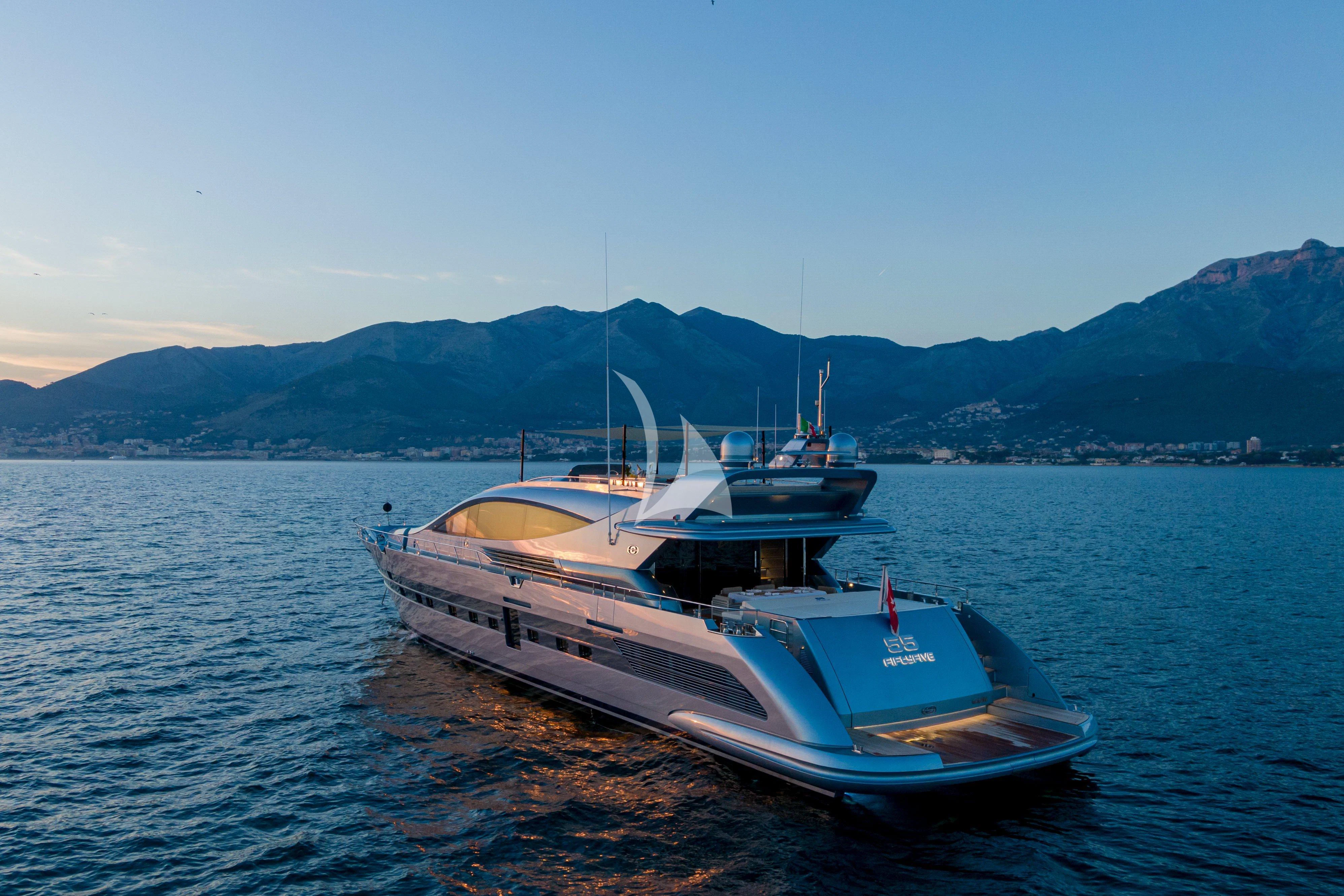 a couple of boats sit in the water aboard 55 FIFTYFIVE Yacht for Charter