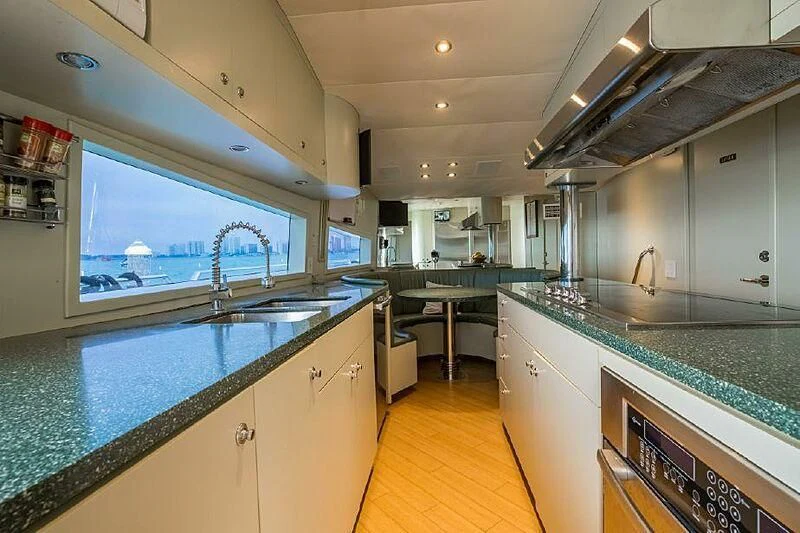 a kitchen with a large island aboard AKIM Yacht for Sale