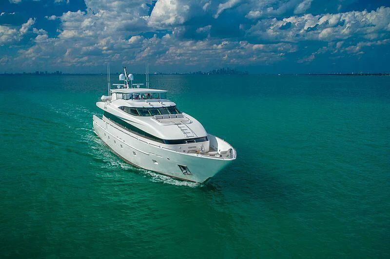 a white boat in the water aboard AKIM Yacht for Sale