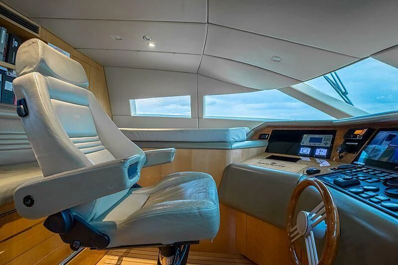 a room with a computer and a chair aboard AKIM Yacht for Sale
