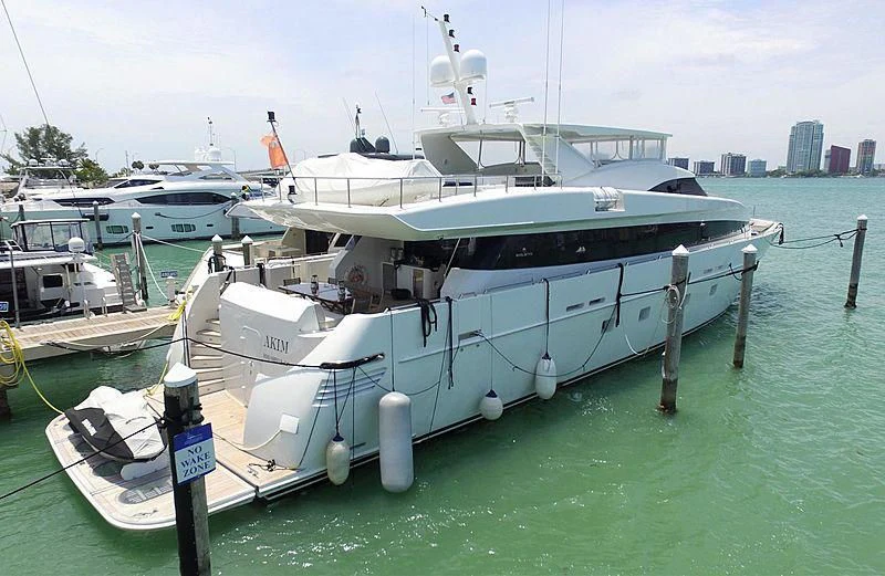 a boat docked at a pier aboard AKIM Yacht for Sale