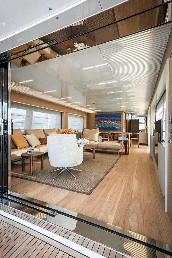 a room with a couch and a table aboard ANINHA 1 Yacht for Sale