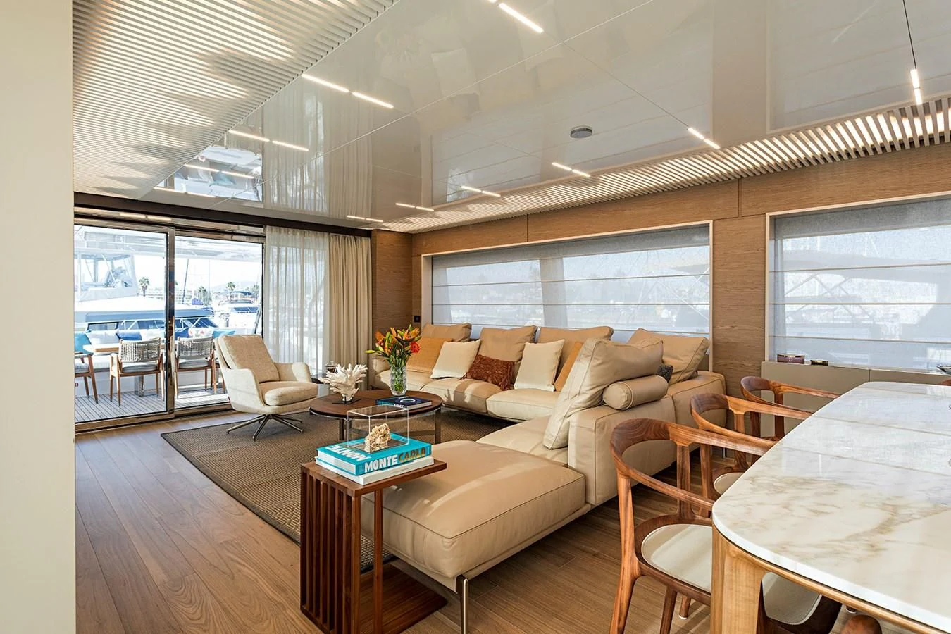 a living room with a couch and a table aboard ANINHA 1 Yacht for Sale