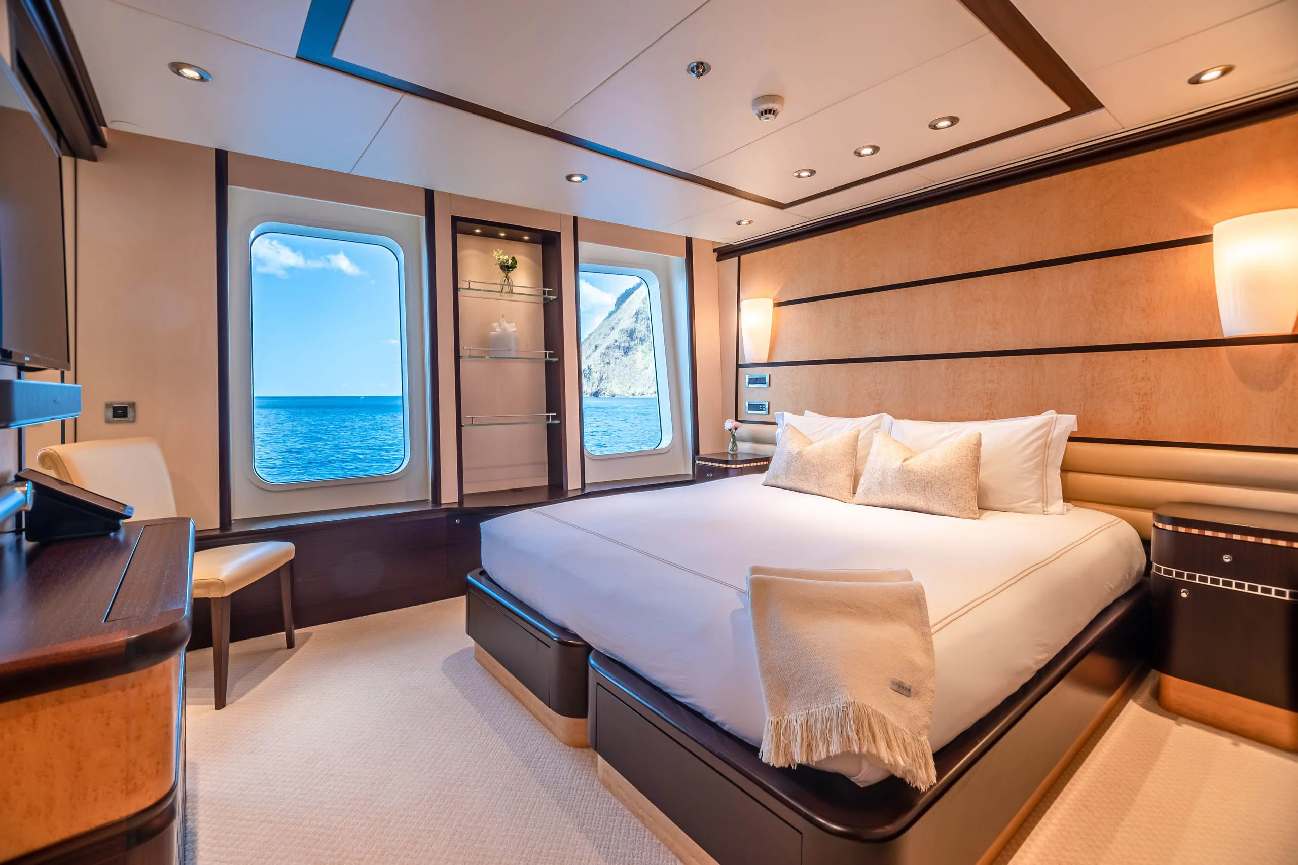 a room with a bed and a desk aboard HARLE Yacht for Sale